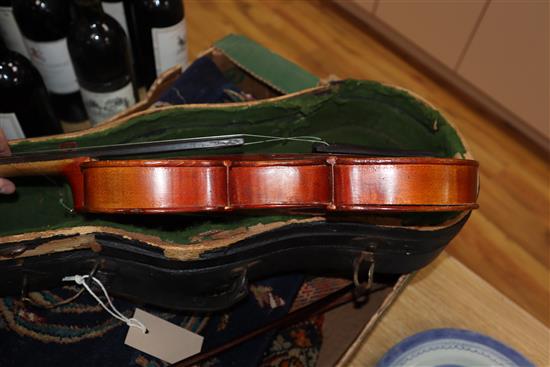 A German three-quarter size violin and bow, cased